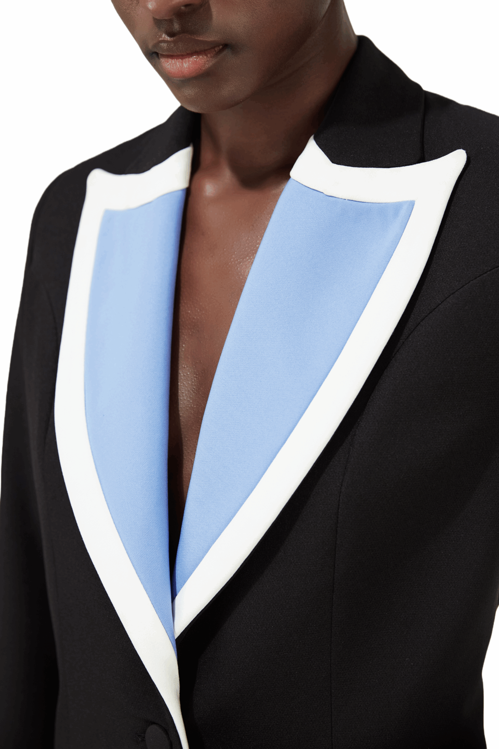 Break away from the ordinary and add an edge to your wardrobe. The Nevro Blue Morpho Blazer is expertly crafted in Greece, designed to make a bold statement. Featuring wide peak lapels with striking two-tone contrasts, this single-breasted blazer is fastened with two black-covered buttons and finished with four matching buttoned cuffs. Functional elegance meets impeccable tailoring with flap pockets, a fully lined interior, a buttoned right breast pocket, and a single back vent for ease of movement. Inspired by the captivating hues of the Blue Morpho butterfly, this blazer mirrors its brilliance—vibrant blue wings framed by black with subtle white accents. Now you know the story behind it.