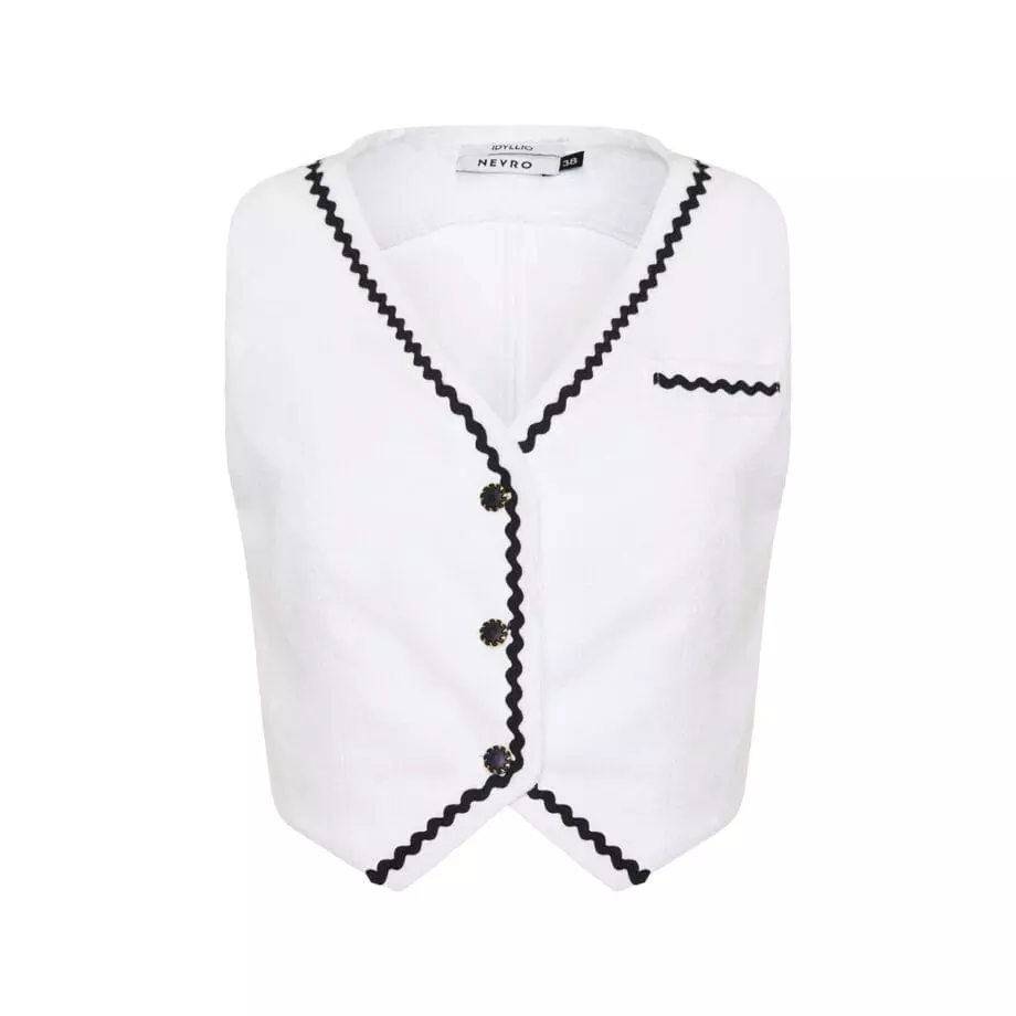 The VOLAX Terry Vest captures sunlit structure in crisp white terry, finished with bold zigzag black trim and a clean, single-breasted silhouette.
