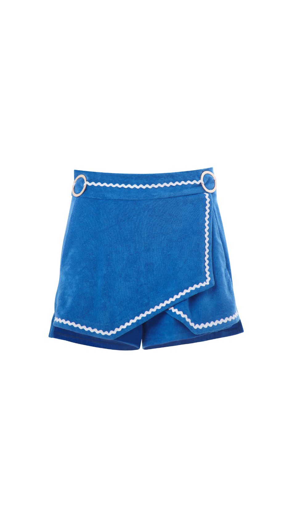The Icarus Terry Shorts feature a sculptural wrap-front design in Cycladic Blue terry, adorned with gold rings and zigzag piping—tailored summer ease, reimagined.