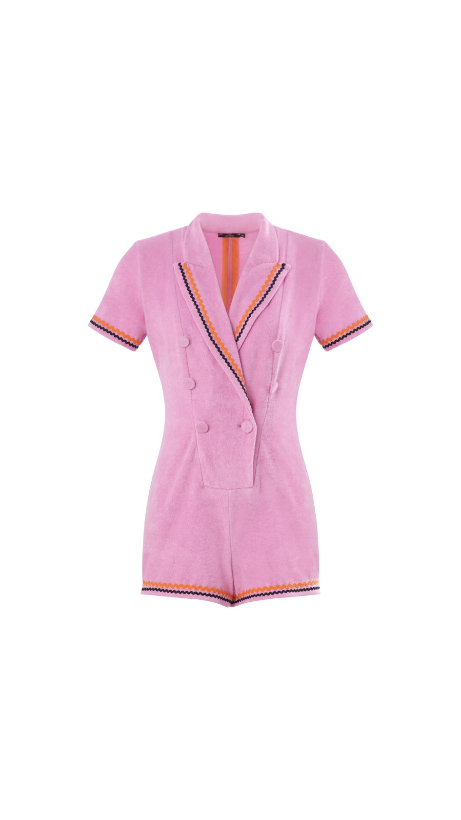 The ROZAKI Terry Playsuit is a sun-drenched tailoring statement in pink terry cloth, finished with orange and black zigzag trim, peak lapels, and a playful double-breasted silhouette.